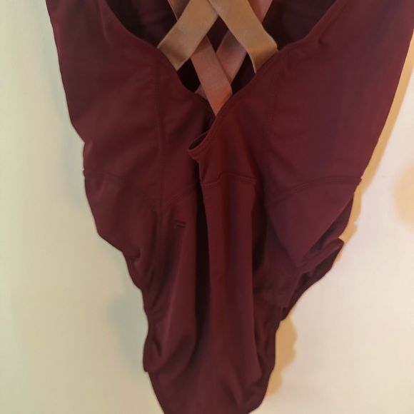 Never worn Fabletics maroon bodysuit with cross back size medium - Picture 10 of 11